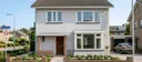 Vrijstaande woning na volledige gevelrenovatie en nieuw schilderwerk